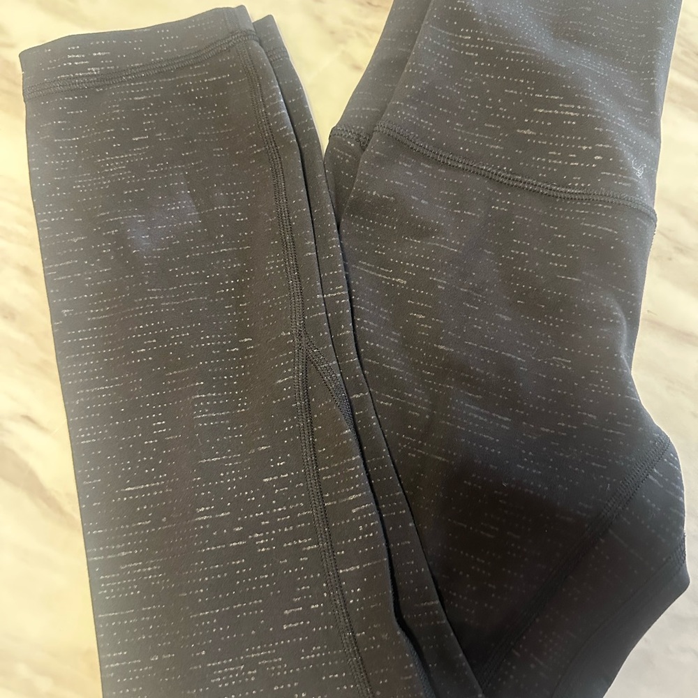 Lululemon Black Leggings, never worn, no pilling size 2 only worn once
